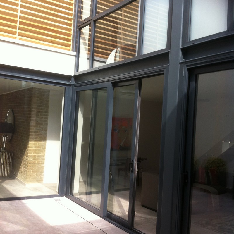 Anthracite aluminium sliding patio doors fitted in Caterham